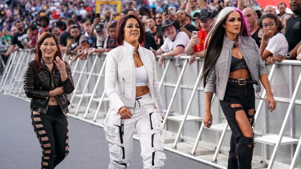 Iyo Sky, Bayley and Dakota Kai entering at SummerSlam